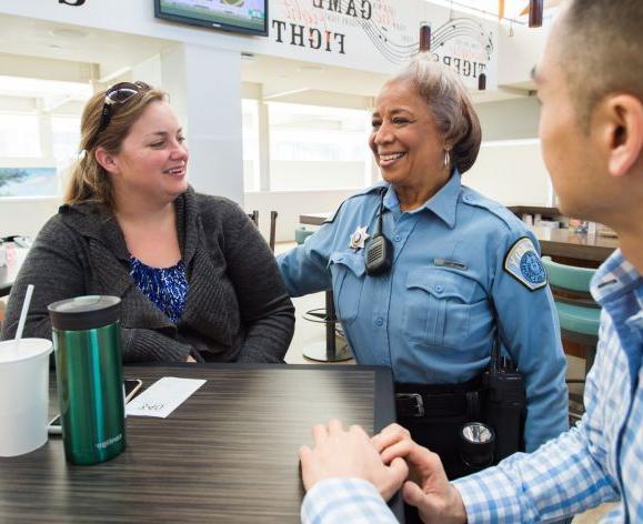 Campus Peace Officer with students